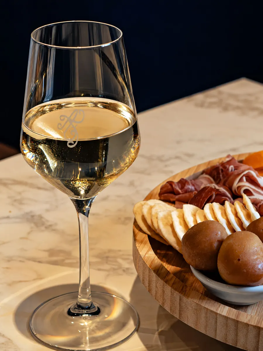 White wine and a cheese board at Almost French Epicure, Melbourne