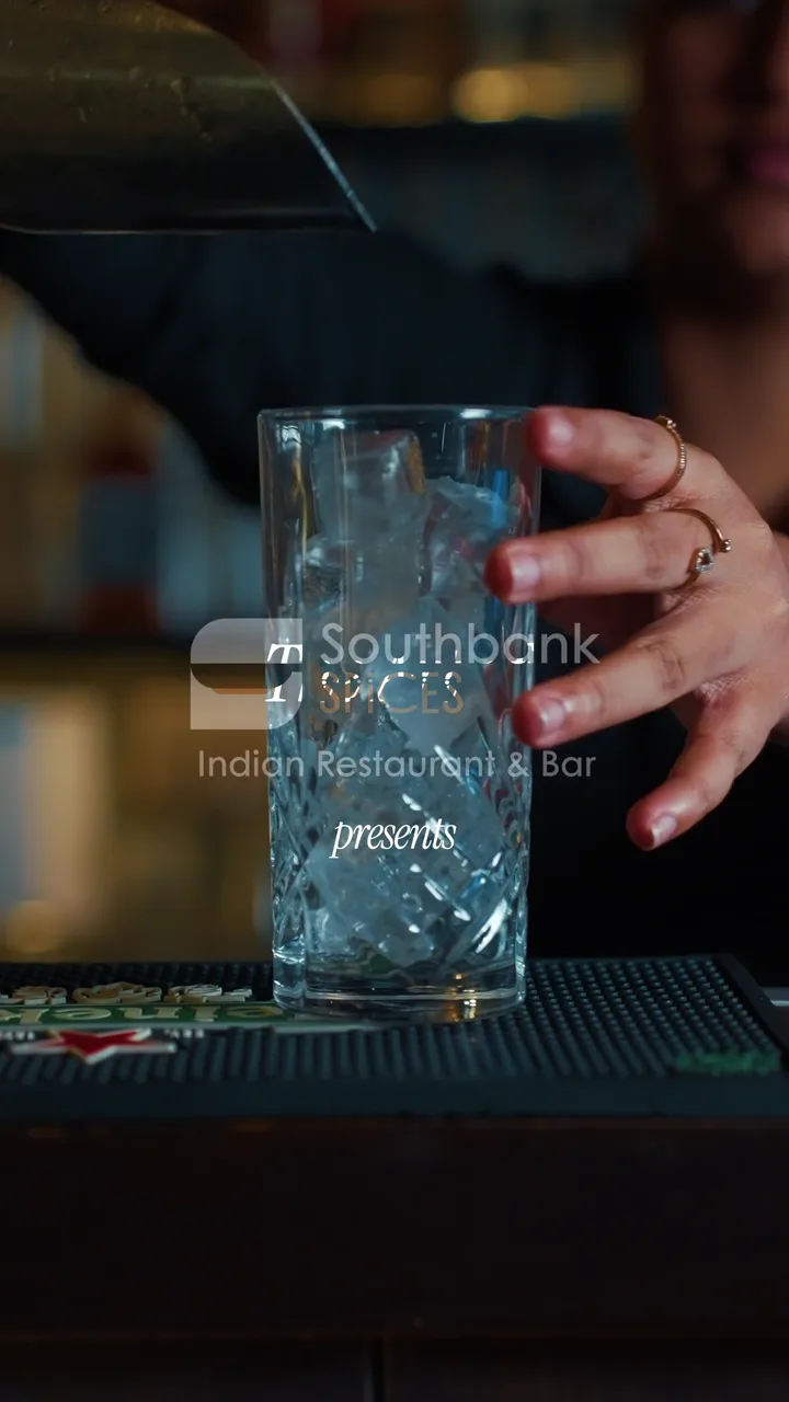 A blue cocktail being made at the Southbank Spices bar